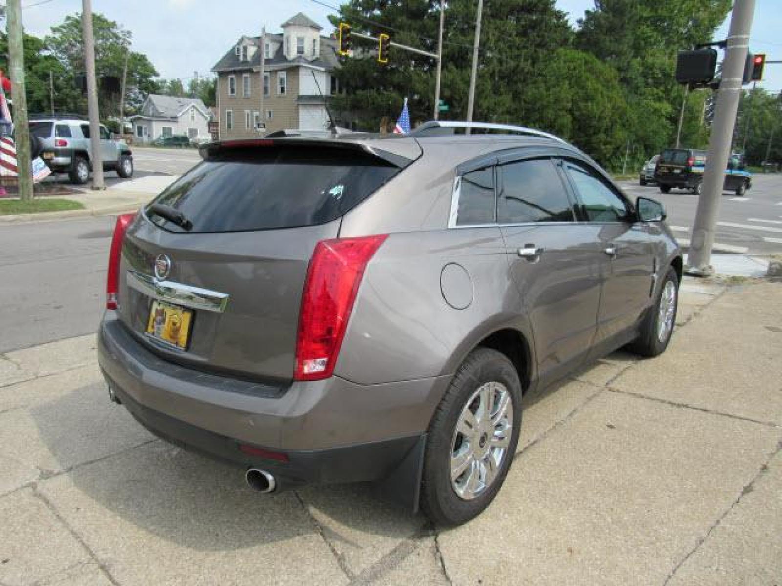 2011 Gold Mist Metallic Cadillac SRX Luxury Collectionn 4WD (3GYFNDEY9BS) with an 3.0 6 Cylinder Fuel Injected engine, 6-Speed Shiftable Automatic transmission, located at 5505 N. Summit St., Toledo, OH, 43611, (419) 729-2688, 41.654953, -83.530014 - Photo #24
