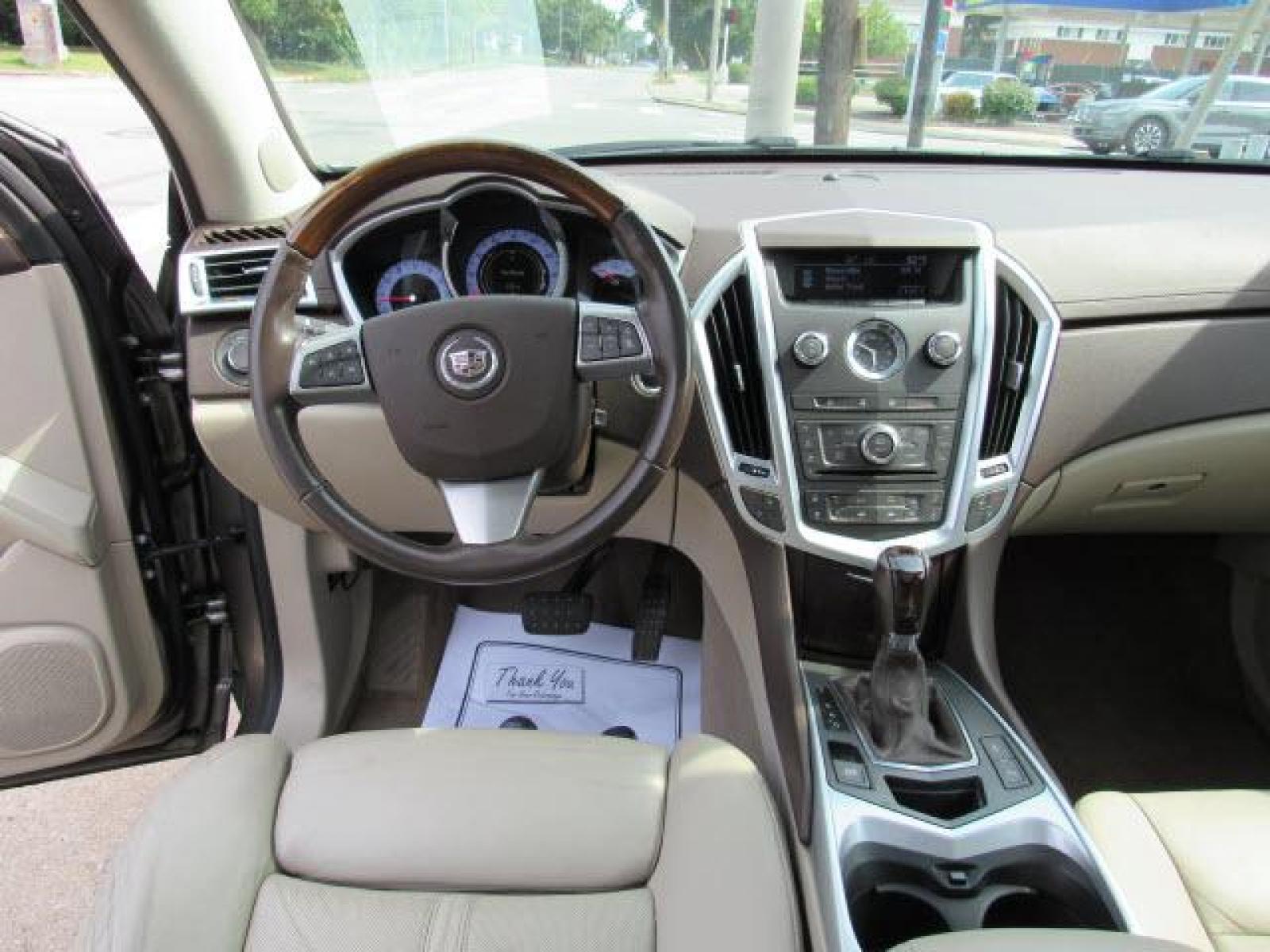 2011 Gold Mist Metallic Cadillac SRX Luxury Collectionn 4WD (3GYFNDEY9BS) with an 3.0 6 Cylinder Fuel Injected engine, 6-Speed Shiftable Automatic transmission, located at 5505 N. Summit St., Toledo, OH, 43611, (419) 729-2688, 41.654953, -83.530014 - Photo #5