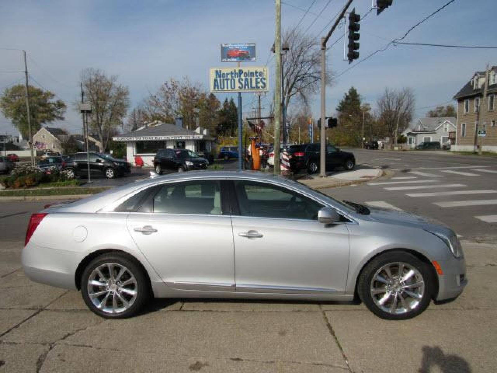 2013 Radiant Silver Metallic Cadillac XTS Luxury Collection AWD (2G61R5S30D9) with an 3.6 6 Cylinder Direct Injection engine, 6-Speed Shiftable Automatic transmission, located at 5505 N. Summit St., Toledo, OH, 43611, (419) 729-2688, 41.654953, -83.530014 - A premium 'turn by turn' navigation system is included. Pack up your clubs AND your buddy's clubs too! Plenty of cargo room for anything you want to take! Extra clean. No rips, no abuse, no cigarette burns. Bring your Digital Music collection to life. This baby is ready to RoCk! Just Plug It In! C - Photo #0
