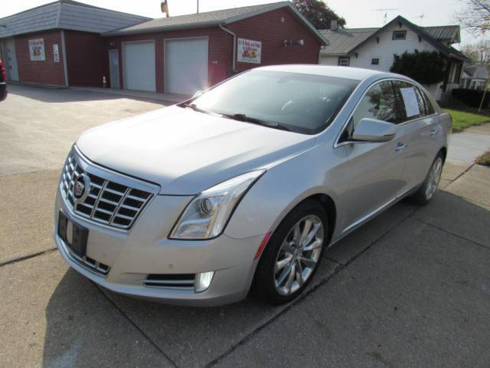 2013 Radiant Silver Metallic Cadillac XTS Luxury Collection AWD (2G61R5S30D9) with an 3.6 6 Cylinder Direct Injection engine, 6-Speed Shiftable Automatic transmission, located at 5505 N. Summit St., Toledo, OH, 43611, (419) 729-2688, 41.654953, -83.530014 - A premium 'turn by turn' navigation system is included. Pack up your clubs AND your buddy's clubs too! Plenty of cargo room for anything you want to take! Extra clean. No rips, no abuse, no cigarette burns. Bring your Digital Music collection to life. This baby is ready to RoCk! Just Plug It In! C - Photo #22
