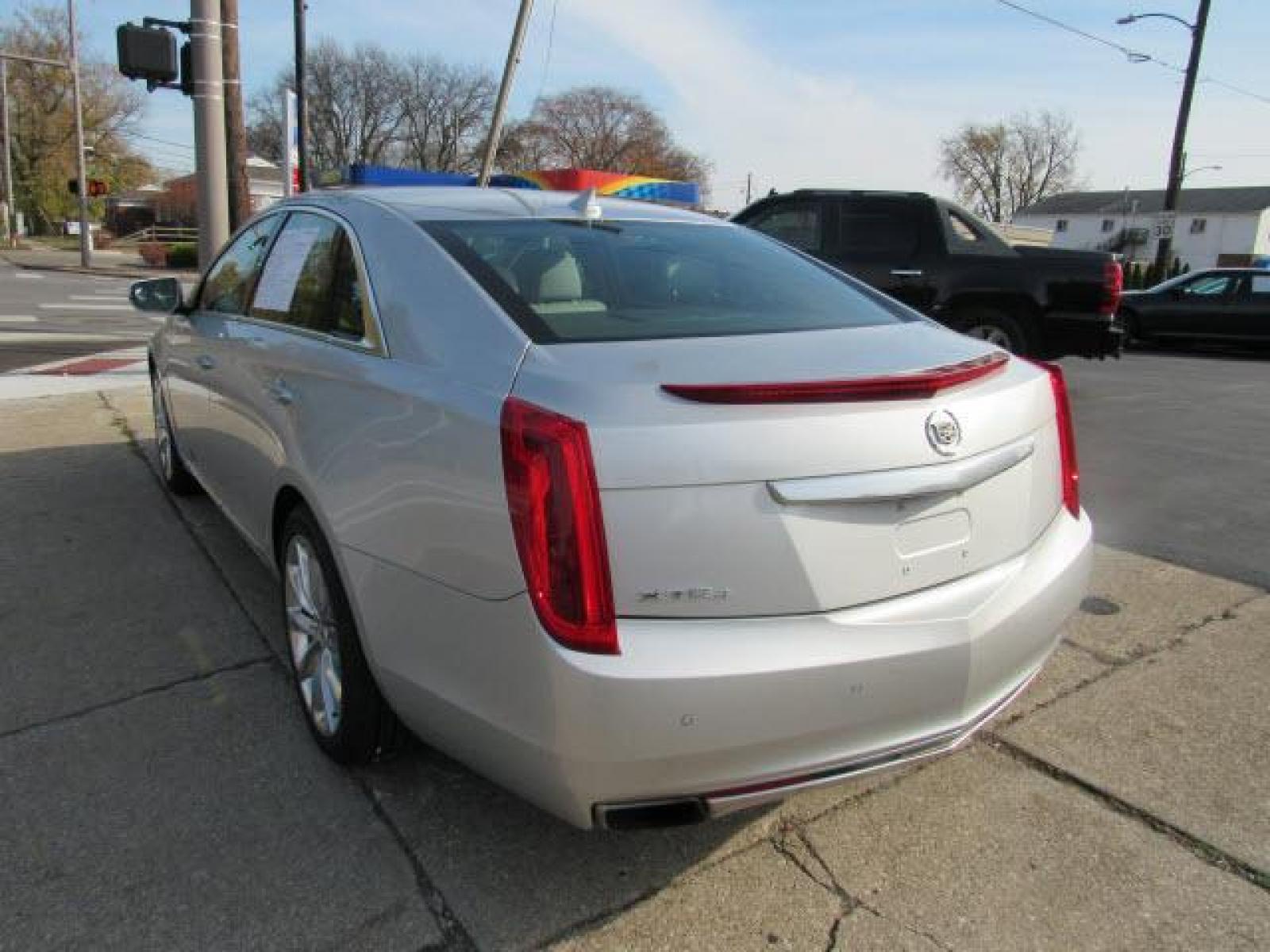 2013 Radiant Silver Metallic Cadillac XTS Luxury Collection AWD (2G61R5S30D9) with an 3.6 6 Cylinder Direct Injection engine, 6-Speed Shiftable Automatic transmission, located at 5505 N. Summit St., Toledo, OH, 43611, (419) 729-2688, 41.654953, -83.530014 - A premium 'turn by turn' navigation system is included. Pack up your clubs AND your buddy's clubs too! Plenty of cargo room for anything you want to take! Extra clean. No rips, no abuse, no cigarette burns. Bring your Digital Music collection to life. This baby is ready to RoCk! Just Plug It In! C - Photo #24