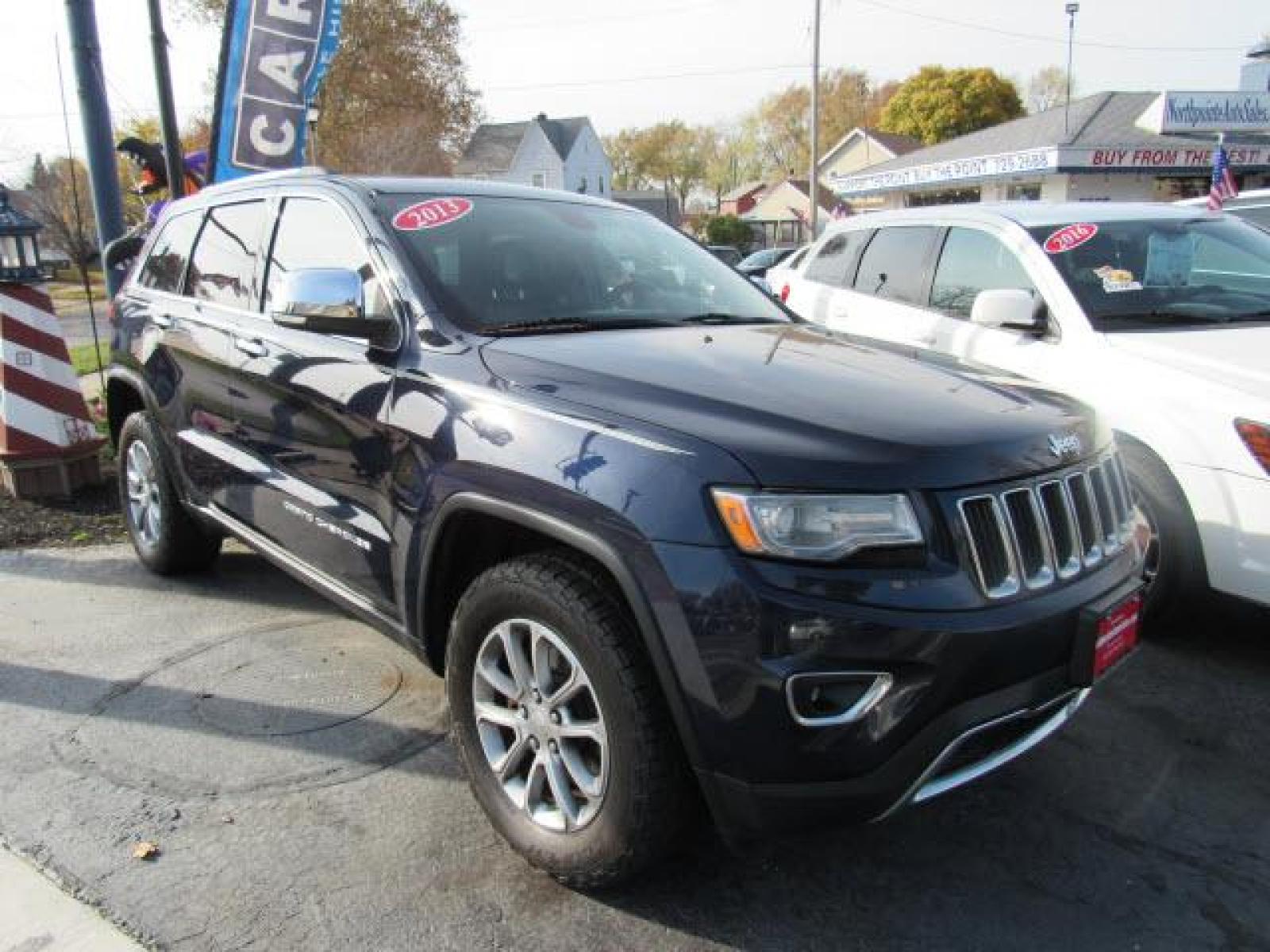 2014 Pacific Blue Clear Coat Jeep Grand Cherokee Limited 4X4 (1C4RJFBG5EC) with an 3.6 6 Cylinder Sequential Multiport Fuel Injection engine, 8-Speed Shiftable Automatic transmission, located at 5505 N. Summit St., Toledo, OH, 43611, (419) 729-2688, 41.654953, -83.530014 - Photo #21