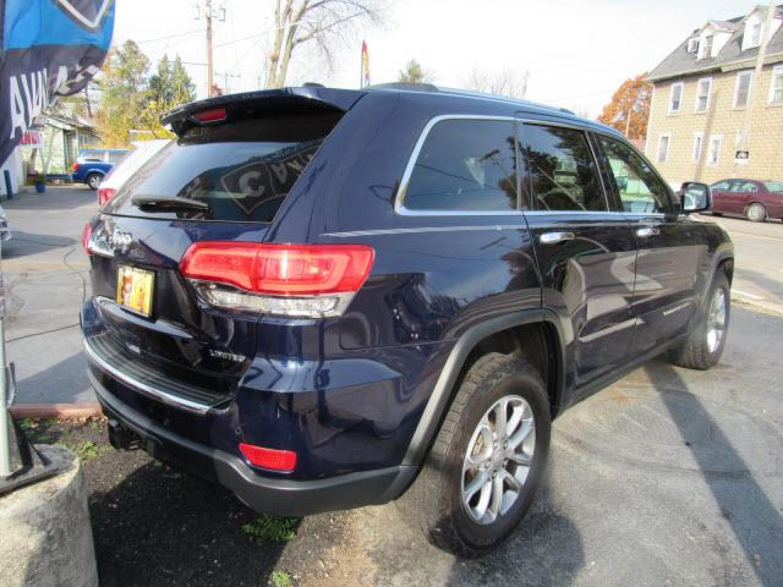 2014 Pacific Blue Clear Coat Jeep Grand Cherokee Limited 4X4 (1C4RJFBG5EC) with an 3.6 6 Cylinder Sequential Multiport Fuel Injection engine, 8-Speed Shiftable Automatic transmission, located at 5505 N. Summit St., Toledo, OH, 43611, (419) 729-2688, 41.654953, -83.530014 - Photo #26