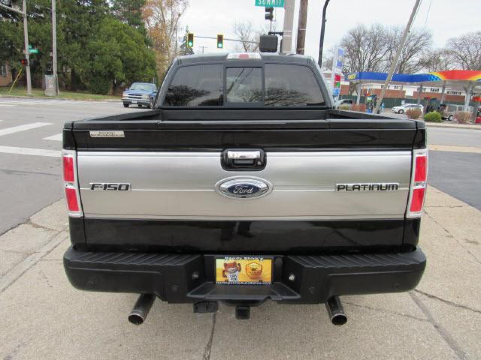 2009 Black Clearcoat Ford F-150 Platinum 4X4 (1FTPW14V19F) with an 5.4 8 Cylinder Sequential Multiport Fuel Injection engine, 6-Speed Automatic transmission, located at 5505 N. Summit St., Toledo, OH, 43611, (419) 729-2688, 41.654953, -83.530014 - Photo #26