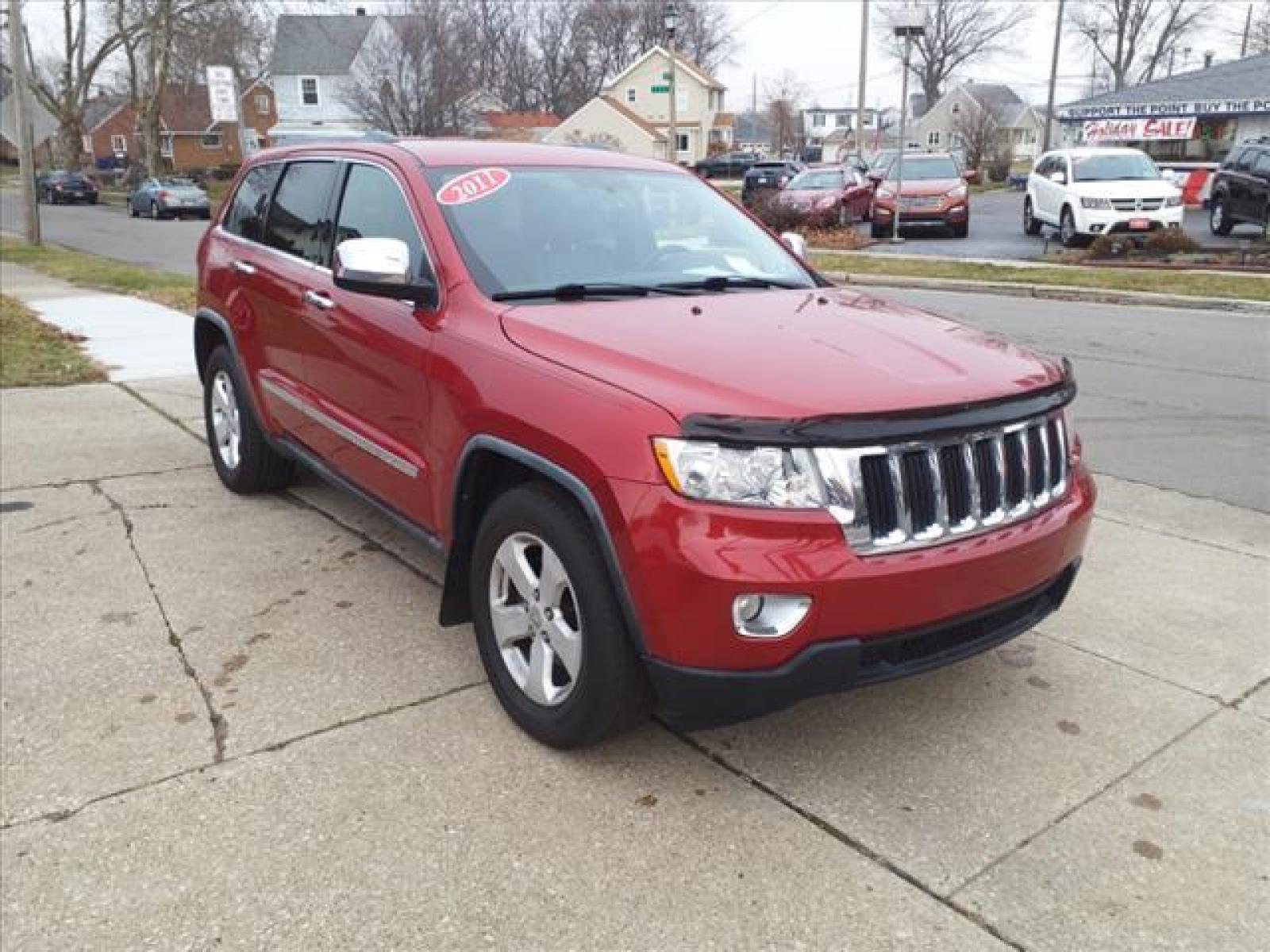 2011 Inferno Red Crystal Pearl Coat Jeep Grand Cherokee Laredo 4X4 (1J4RR4GG5BC) with an 3.6 6 Cylinder Sequential Multiport Fuel Injection engine, 5-Speed Automatic transmission, located at 5505 N. Summit St., Toledo, OH, 43611, (419) 729-2688, 41.654953, -83.530014 - Photo #17