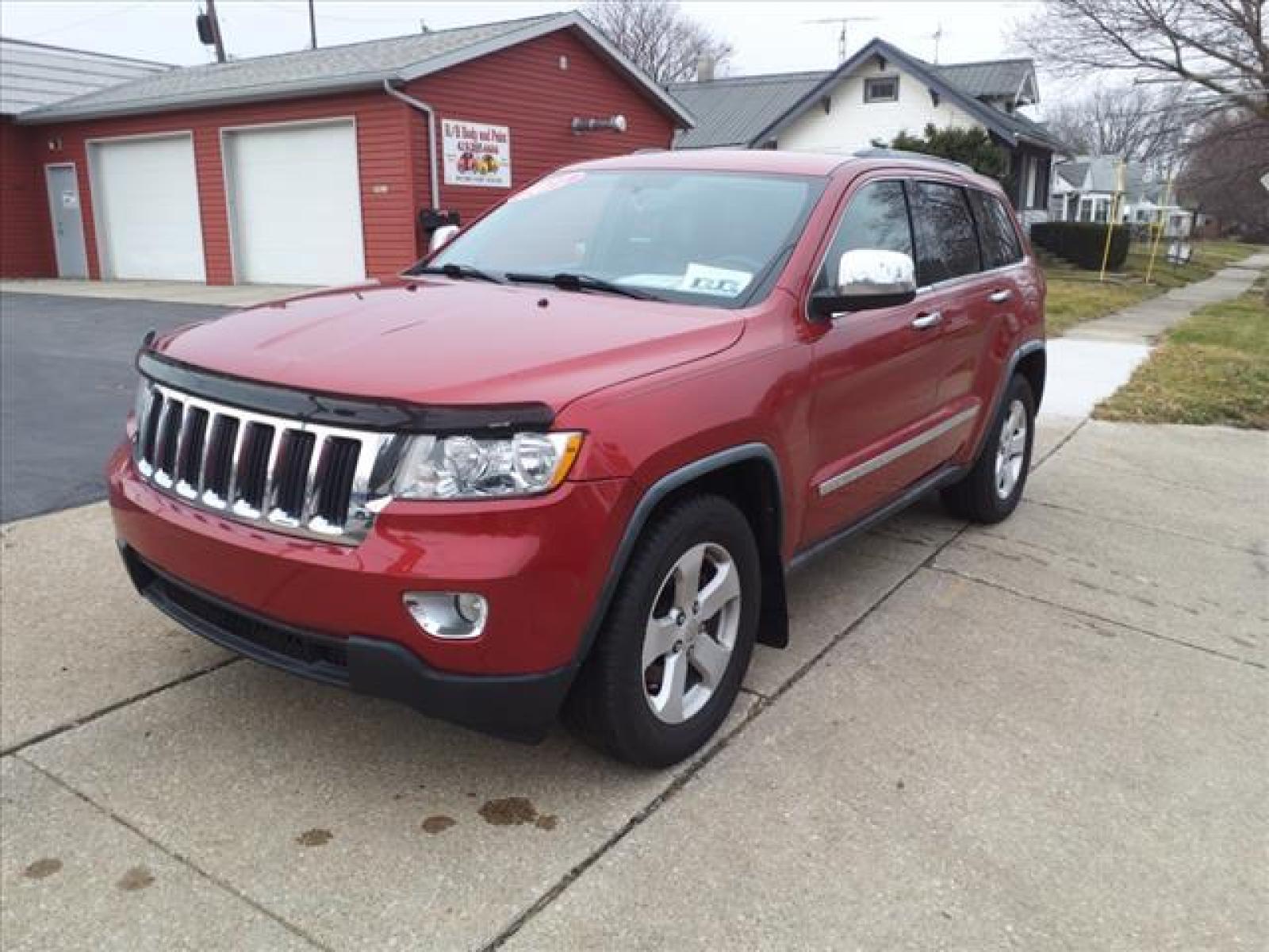 2011 Inferno Red Crystal Pearl Coat Jeep Grand Cherokee Laredo 4X4 (1J4RR4GG5BC) with an 3.6 6 Cylinder Sequential Multiport Fuel Injection engine, 5-Speed Automatic transmission, located at 5505 N. Summit St., Toledo, OH, 43611, (419) 729-2688, 41.654953, -83.530014 - Photo #19