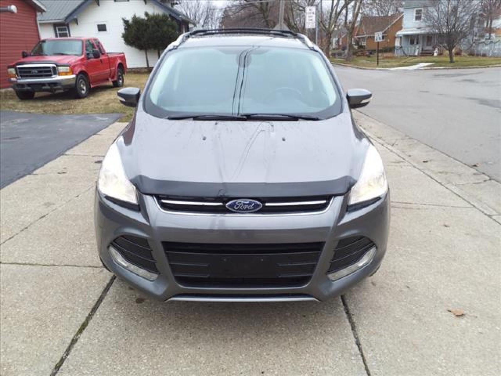 2014 Sterling Gray Metallic Ford Escape Titanium (1FMCU9J99EU) with an 2.0L EcoBoost 2.0L Turbo I4 24 Direct Injection engine, 6-Speed Shiftable Automatic transmission, located at 5505 N. Summit St., Toledo, OH, 43611, (419) 729-2688, 41.654953, -83.530014 - Photo #20