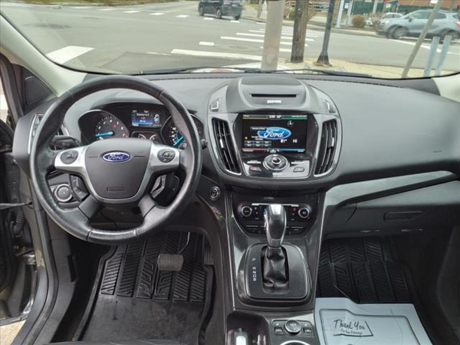 2014 Sterling Gray Metallic Ford Escape Titanium (1FMCU9J99EU) with an 2.0L EcoBoost 2.0L Turbo I4 24 Direct Injection engine, 6-Speed Shiftable Automatic transmission, located at 5505 N. Summit St., Toledo, OH, 43611, (419) 729-2688, 41.654953, -83.530014 - Photo #5