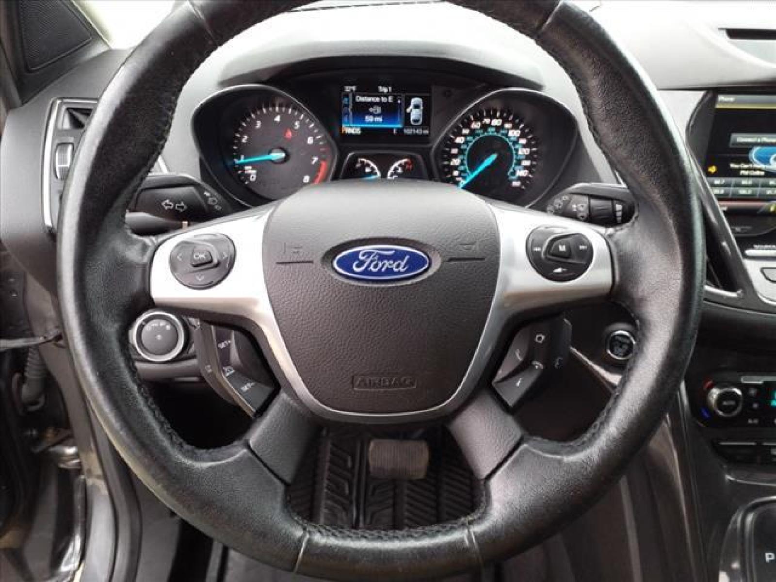 2014 Sterling Gray Metallic Ford Escape Titanium (1FMCU9J99EU) with an 2.0L EcoBoost 2.0L Turbo I4 24 Direct Injection engine, 6-Speed Shiftable Automatic transmission, located at 5505 N. Summit St., Toledo, OH, 43611, (419) 729-2688, 41.654953, -83.530014 - Photo #7