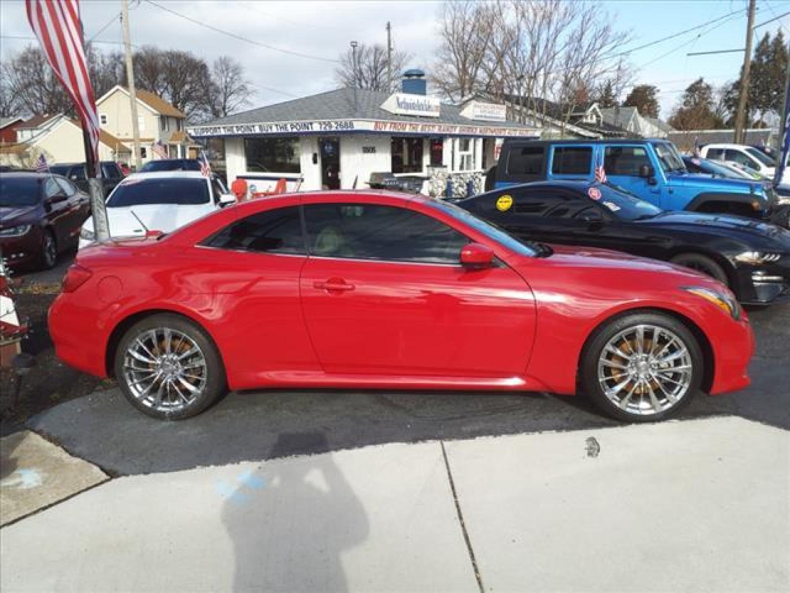 2013 Vibrant Red INFINITI G37 Convertible Sport (JN1CV6FE4DM) with an 3.7L 3.7L V6 325hp 267ft. lbs. Sequential Multiport Fuel Injection engine, 6-Speed Manual transmission, located at 5505 N. Summit St., Toledo, OH, 43611, (419) 729-2688, 41.654953, -83.530014 - Photo #0