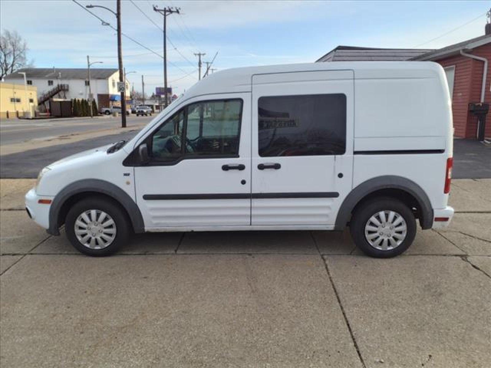 2012 Frozen White Ford Transit Connect XLT (NM0LS6BN7CT) with an 2.0L Duratec 2.0L I4 136hp 128 Sequential Multiport Fuel Injection engine, 4-Speed Automatic transmission, located at 5505 N. Summit St., Toledo, OH, 43611, (419) 729-2688, 41.654953, -83.530014 - Photo #16