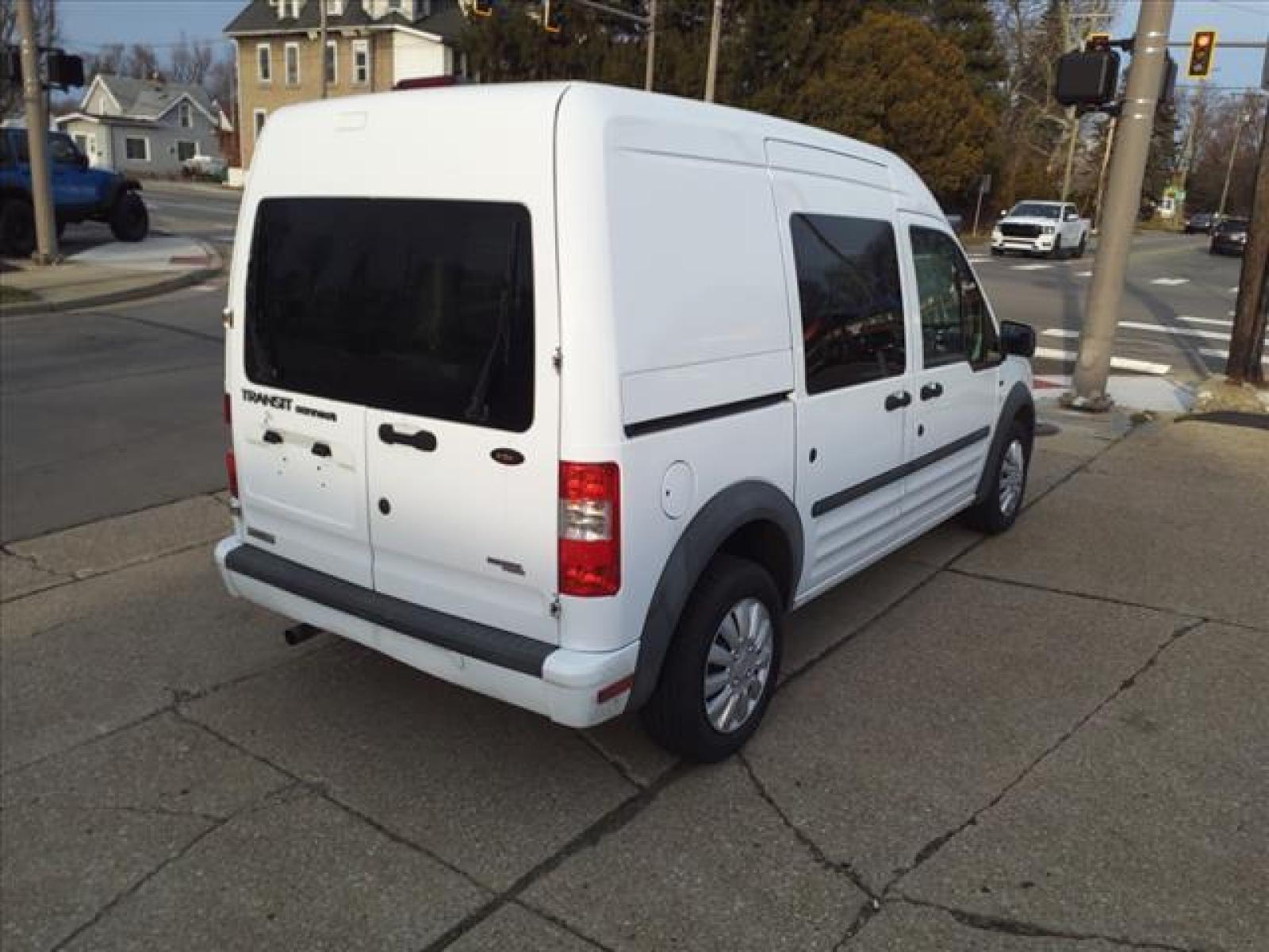 2012 Frozen White Ford Transit Connect XLT (NM0LS6BN7CT) with an 2.0L Duratec 2.0L I4 136hp 128 Sequential Multiport Fuel Injection engine, 4-Speed Automatic transmission, located at 5505 N. Summit St., Toledo, OH, 43611, (419) 729-2688, 41.654953, -83.530014 - Photo #19