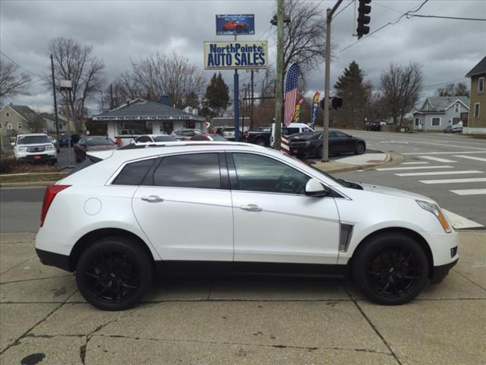 2013 Off White Cadillac SRX Premium Collection (3GYFNJE3XDS) with an 3.6L 3.6L Flex Fuel V6 308hp 2 Direct Injection engine, 6-Speed Shiftable Automatic transmission, located at 5505 N. Summit St., Toledo, OH, 43611, (419) 729-2688, 41.654953, -83.530014 - Photo #0