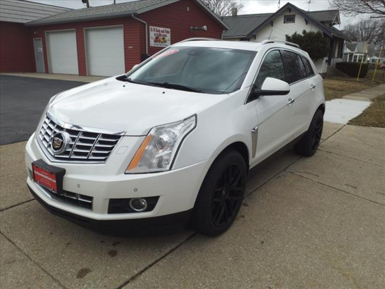 2013 Off White Cadillac SRX Premium Collection (3GYFNJE3XDS) with an 3.6L 3.6L Flex Fuel V6 308hp 2 Direct Injection engine, 6-Speed Shiftable Automatic transmission, located at 5505 N. Summit St., Toledo, OH, 43611, (419) 729-2688, 41.654953, -83.530014 - Photo #22