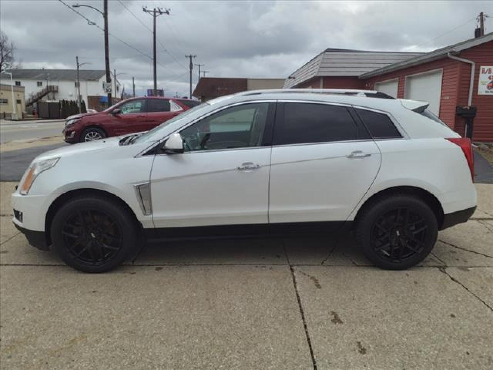 2013 Off White Cadillac SRX Premium Collection (3GYFNJE3XDS) with an 3.6L 3.6L Flex Fuel V6 308hp 2 Direct Injection engine, 6-Speed Shiftable Automatic transmission, located at 5505 N. Summit St., Toledo, OH, 43611, (419) 729-2688, 41.654953, -83.530014 - Photo #23
