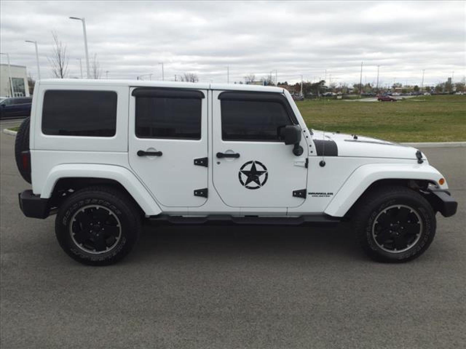 2012 Bright White Clear Coat Jeep Wrangler Unlimited Sahara (1C4BJWEG5CL) with an 3.6L 3.6L V6 285hp 260ft. lbs. Sequential Multiport Fuel Injection engine, 6-Speed Manual transmission, located at 5505 N. Summit St., Toledo, OH, 43611, (419) 729-2688, 41.654953, -83.530014 - Photo #0