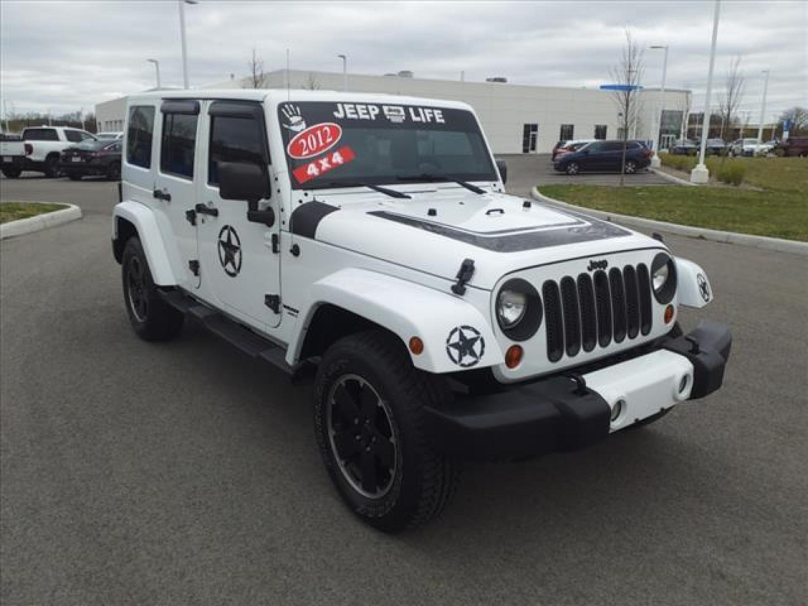 2012 Bright White Clear Coat Jeep Wrangler Unlimited Sahara (1C4BJWEG5CL) with an 3.6L 3.6L V6 285hp 260ft. lbs. Sequential Multiport Fuel Injection engine, 6-Speed Manual transmission, located at 5505 N. Summit St., Toledo, OH, 43611, (419) 729-2688, 41.654953, -83.530014 - Photo #15