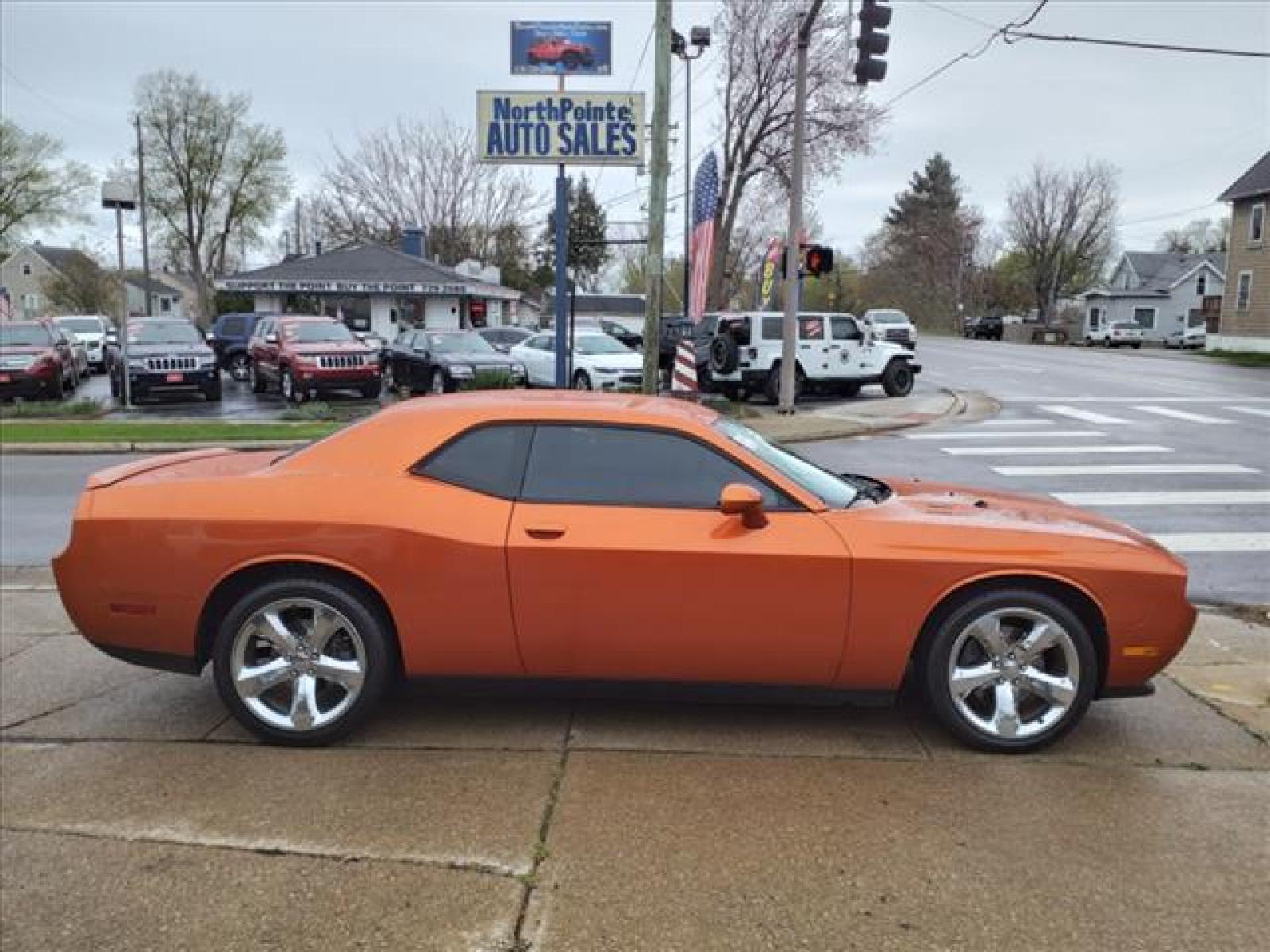 2011 Toxic Orange Pearl Coat Dodge Challenger R/T (2B3CJ5DT9BH) with an 5.7L HEMI 5.7L V8 372hp 401ft. Sequential Multiport Fuel Injection engine, Automatic transmission, located at 5505 N. Summit St., Toledo, OH, 43611, (419) 729-2688, 41.654953, -83.530014 - Photo #0