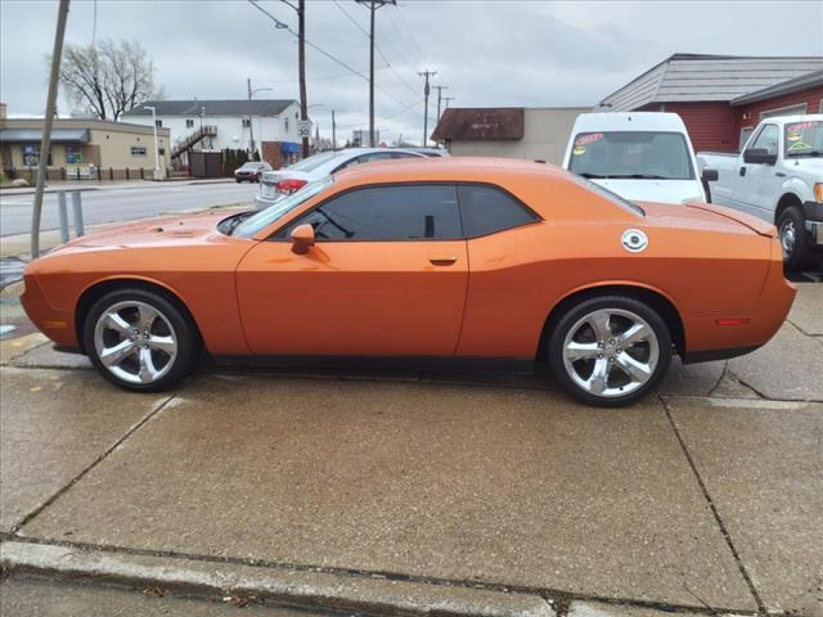 2011 Toxic Orange Pearl Coat Dodge Challenger R/T (2B3CJ5DT9BH) with an 5.7L HEMI 5.7L V8 372hp 401ft. Sequential Multiport Fuel Injection engine, Automatic transmission, located at 5505 N. Summit St., Toledo, OH, 43611, (419) 729-2688, 41.654953, -83.530014 - Photo #18