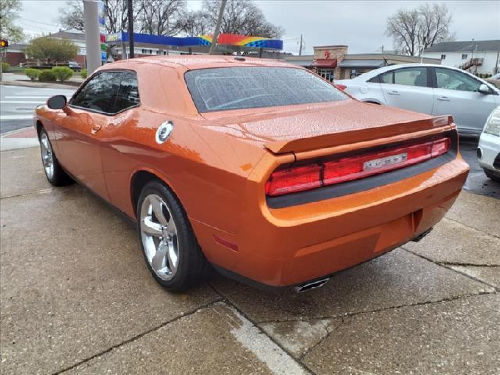 2011 Toxic Orange Pearl Coat Dodge Challenger R/T (2B3CJ5DT9BH) with an 5.7L HEMI 5.7L V8 372hp 401ft. Sequential Multiport Fuel Injection engine, Automatic transmission, located at 5505 N. Summit St., Toledo, OH, 43611, (419) 729-2688, 41.654953, -83.530014 - Photo #19
