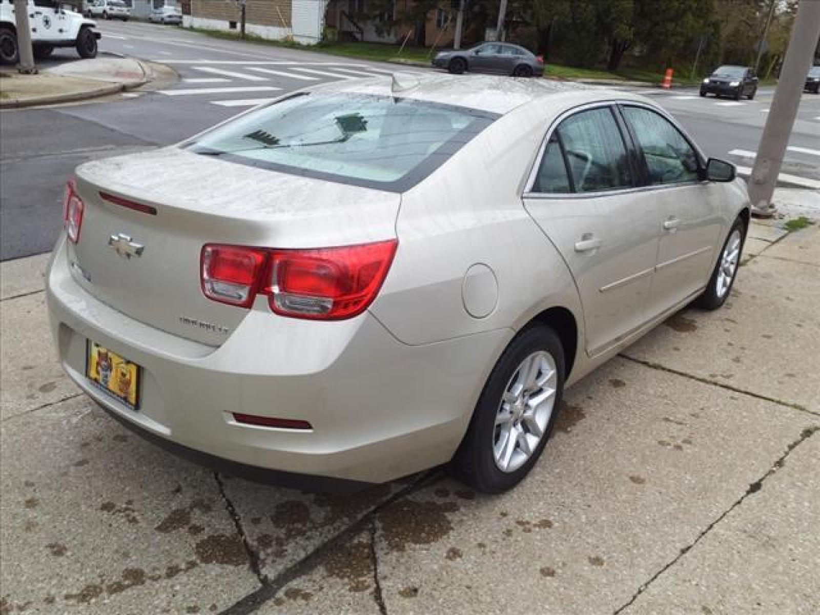 2015 Champagne Silver Metallic Chevrolet Malibu LT (1G11C5SL2FF) with an 2.5L Ecotec 2.5L I4 196hp 191f Direct Injection engine, 6-Speed Shiftable Automatic w/Overdrive transmission, located at 5505 N. Summit St., Toledo, OH, 43611, (419) 729-2688, 41.654953, -83.530014 - Photo #20