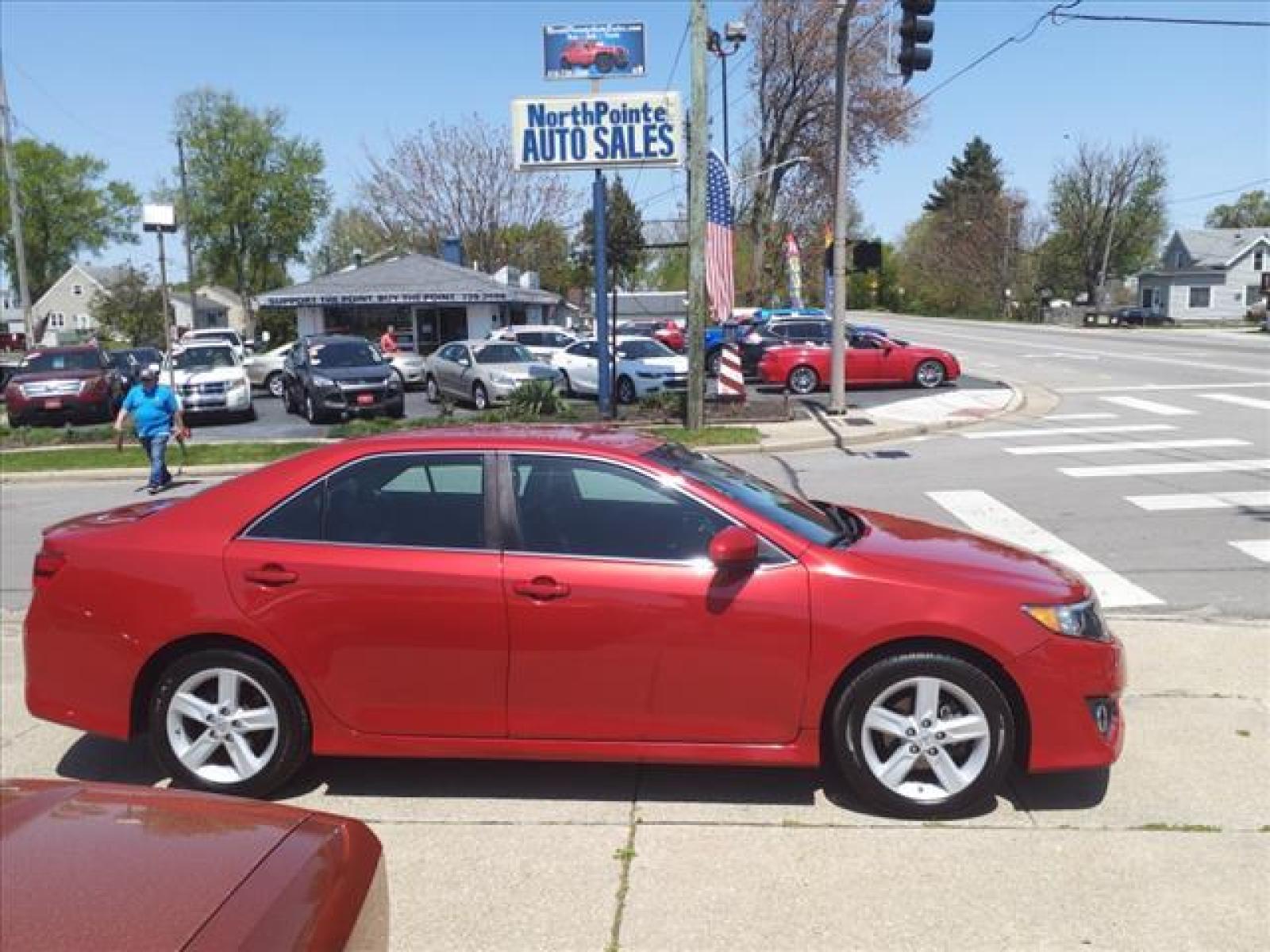 2013 Barcelona Red Metallic Toyota Camry SE (4T1BF1FK8DU) with an 2.5L 2.5L I4 178hp 170ft. lbs. Sequential Multiport Fuel Injection engine, 6-Speed Shiftable Automatic transmission, located at 5505 N. Summit St., Toledo, OH, 43611, (419) 729-2688, 41.654953, -83.530014 - Photo #0