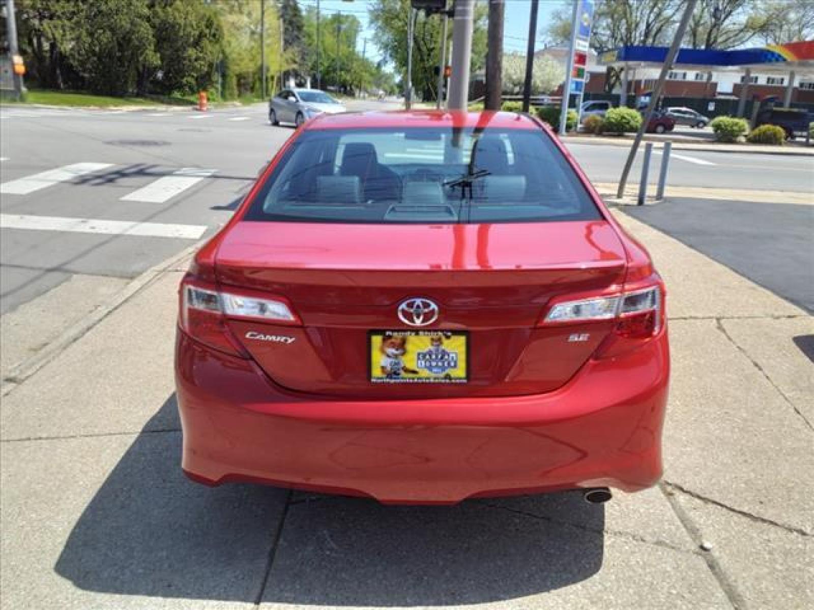 2013 Barcelona Red Metallic Toyota Camry SE (4T1BF1FK8DU) with an 2.5L 2.5L I4 178hp 170ft. lbs. Sequential Multiport Fuel Injection engine, 6-Speed Shiftable Automatic transmission, located at 5505 N. Summit St., Toledo, OH, 43611, (419) 729-2688, 41.654953, -83.530014 - Photo #19