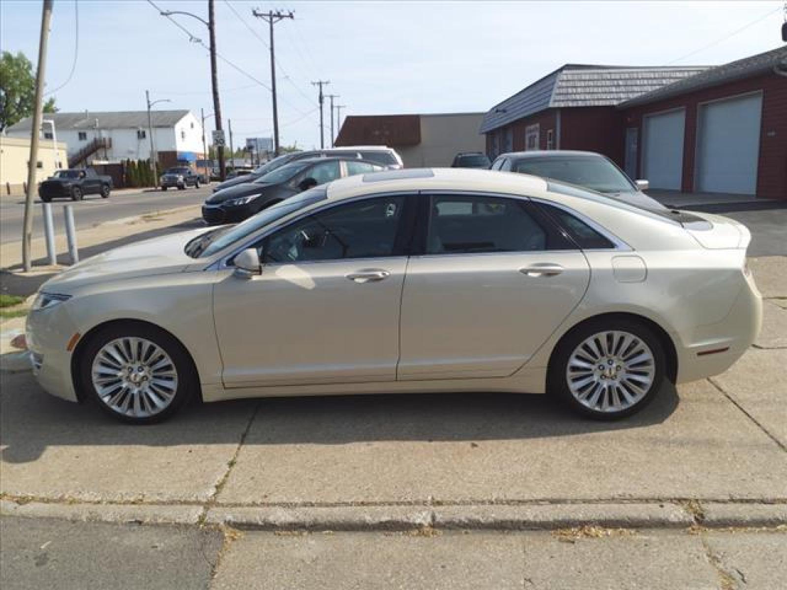 2014 Platinum Dune Metallic Tri-Coat Lincoln MKZ Base (3LN6L2J95ER) with an 2.0L EcoBoost 2.0L Turbo I4 24 Direct Injection engine, 6-Speed Shiftable Automatic transmission, located at 5505 N. Summit St., Toledo, OH, 43611, (419) 729-2688, 41.654953, -83.530014 - Photo #19