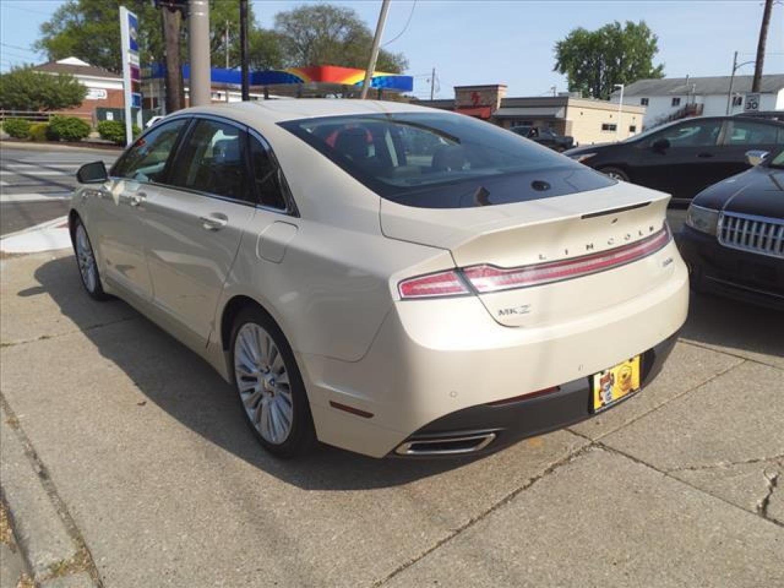 2014 Platinum Dune Metallic Tri-Coat Lincoln MKZ Base (3LN6L2J95ER) with an 2.0L EcoBoost 2.0L Turbo I4 24 Direct Injection engine, 6-Speed Shiftable Automatic transmission, located at 5505 N. Summit St., Toledo, OH, 43611, (419) 729-2688, 41.654953, -83.530014 - Photo #20