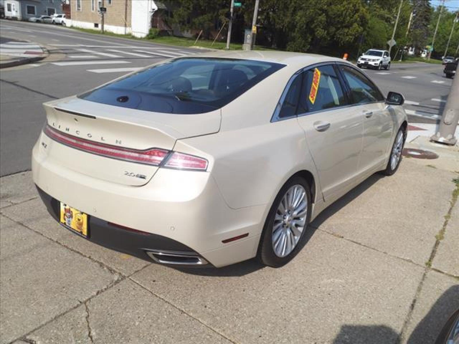2014 Platinum Dune Metallic Tri-Coat Lincoln MKZ Base (3LN6L2J95ER) with an 2.0L EcoBoost 2.0L Turbo I4 24 Direct Injection engine, 6-Speed Shiftable Automatic transmission, located at 5505 N. Summit St., Toledo, OH, 43611, (419) 729-2688, 41.654953, -83.530014 - Photo #22