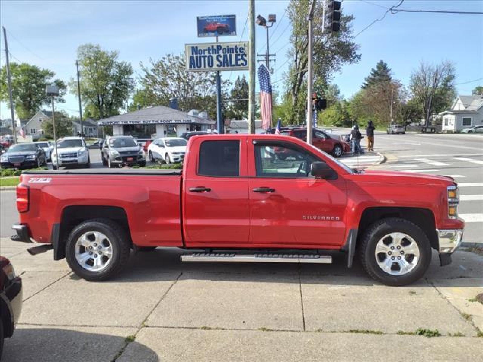 2014 Victory Red Chevrolet Silverado 1500 LT Z71 (1GCVKREH3EZ) with an 4.3L EcoTec3 4.3L Flex Fuel V6 Direct Injection engine, 6-Speed Shiftable Automatic w/Overdrive transmission, located at 5505 N. Summit St., Toledo, OH, 43611, (419) 729-2688, 41.654953, -83.530014 - Photo #0