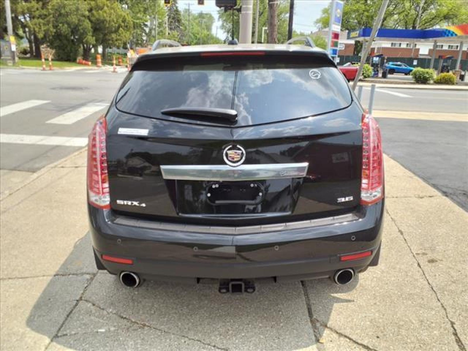 2016 Black Raven Cadillac SRX Performance Collection (3GYFNCE35GS) with an 3.6L 3.6L V6 308hp 265ft. lbs. Direct Injection engine, 6-Speed Automatic transmission, located at 5505 N. Summit St., Toledo, OH, 43611, (419) 729-2688, 41.654953, -83.530014 - Photo #25