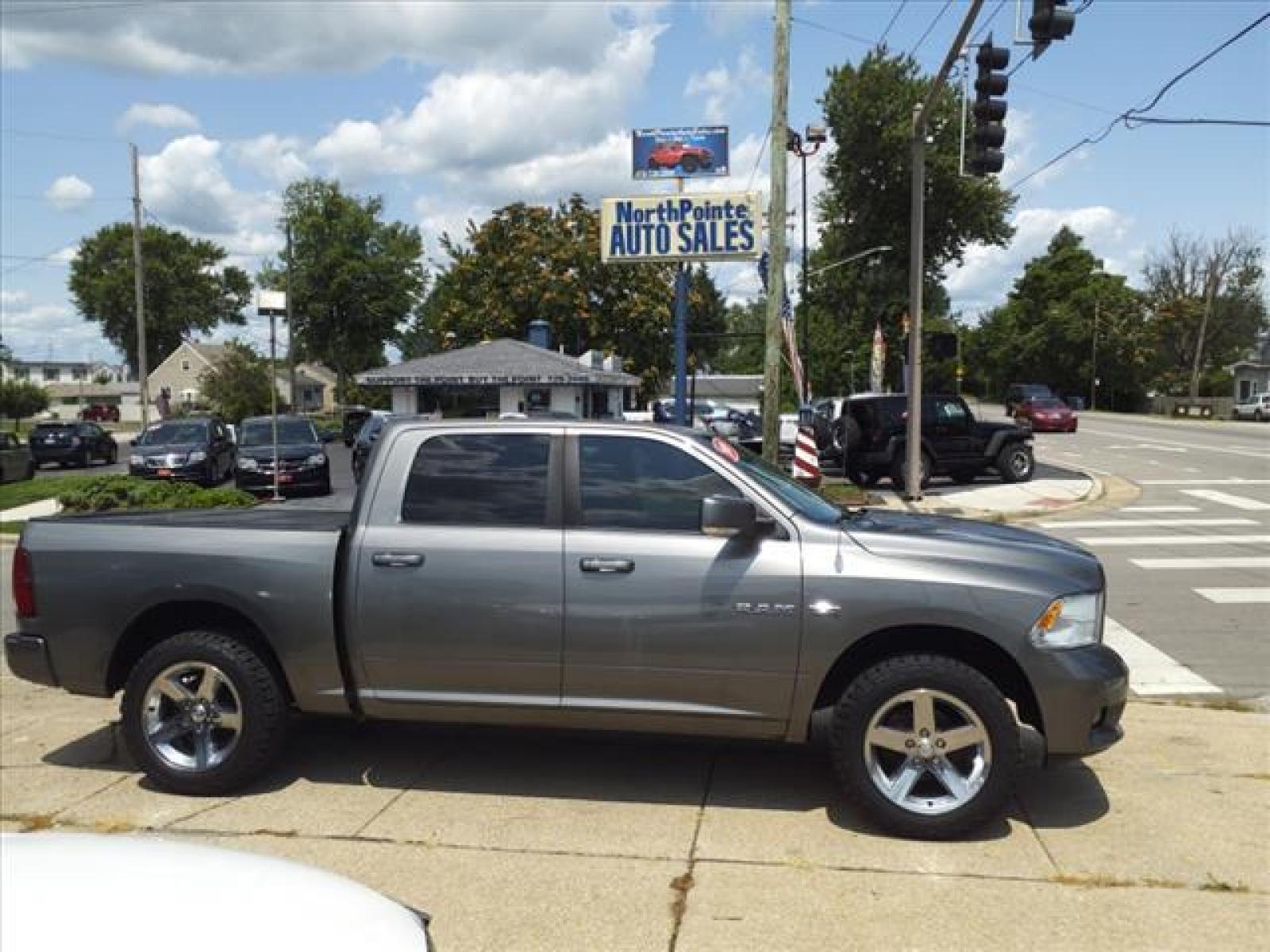 2009 Light Graystone Pearl Coat Dodge Ram 1500 SLT (1D3HV13TX9S) with an 5.7L HEMI 5.7L V8 390hp 407ft. Sequential Multiport Fuel Injection engine, 5-Speed Automatic transmission, located at 5505 N. Summit St., Toledo, OH, 43611, (419) 729-2688, 41.654953, -83.530014 - Photo #0