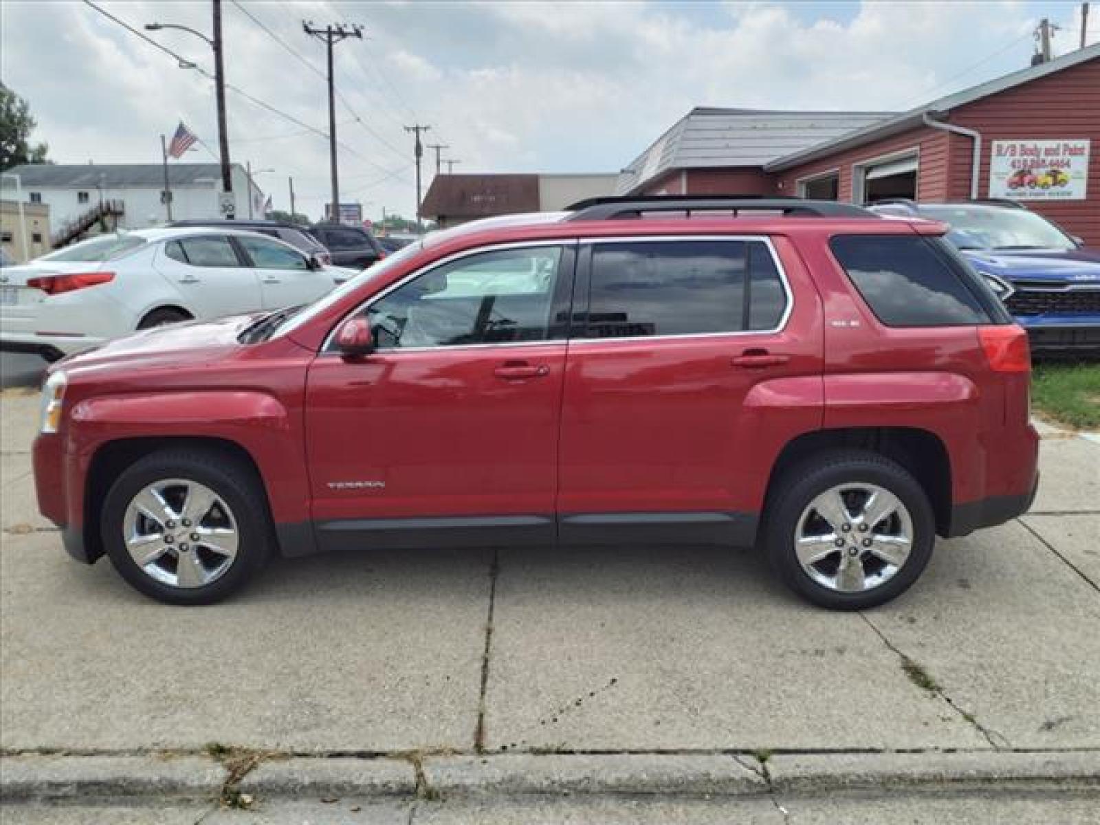 2014 Crystal Red Tintcoat GMC Terrain SLE-2 (2GKALREK6E6) with an 2.4L Ecotec 2.4L I4 182hp 172f Direct Injection engine, 6-Speed Shiftable Automatic transmission, located at 5505 N. Summit St., Toledo, OH, 43611, (419) 729-2688, 41.654953, -83.530014 - Bring your Digital Music collection to life. This baby is ready to RoCk! Just Plug It In! Buy with confidence - maintenance records are available for this vehicle showing immaculate care. Breathe easy! This is a Non Smoker vehicle! This vehicle is loaded with lot of extras. No need to speak up - Photo #21