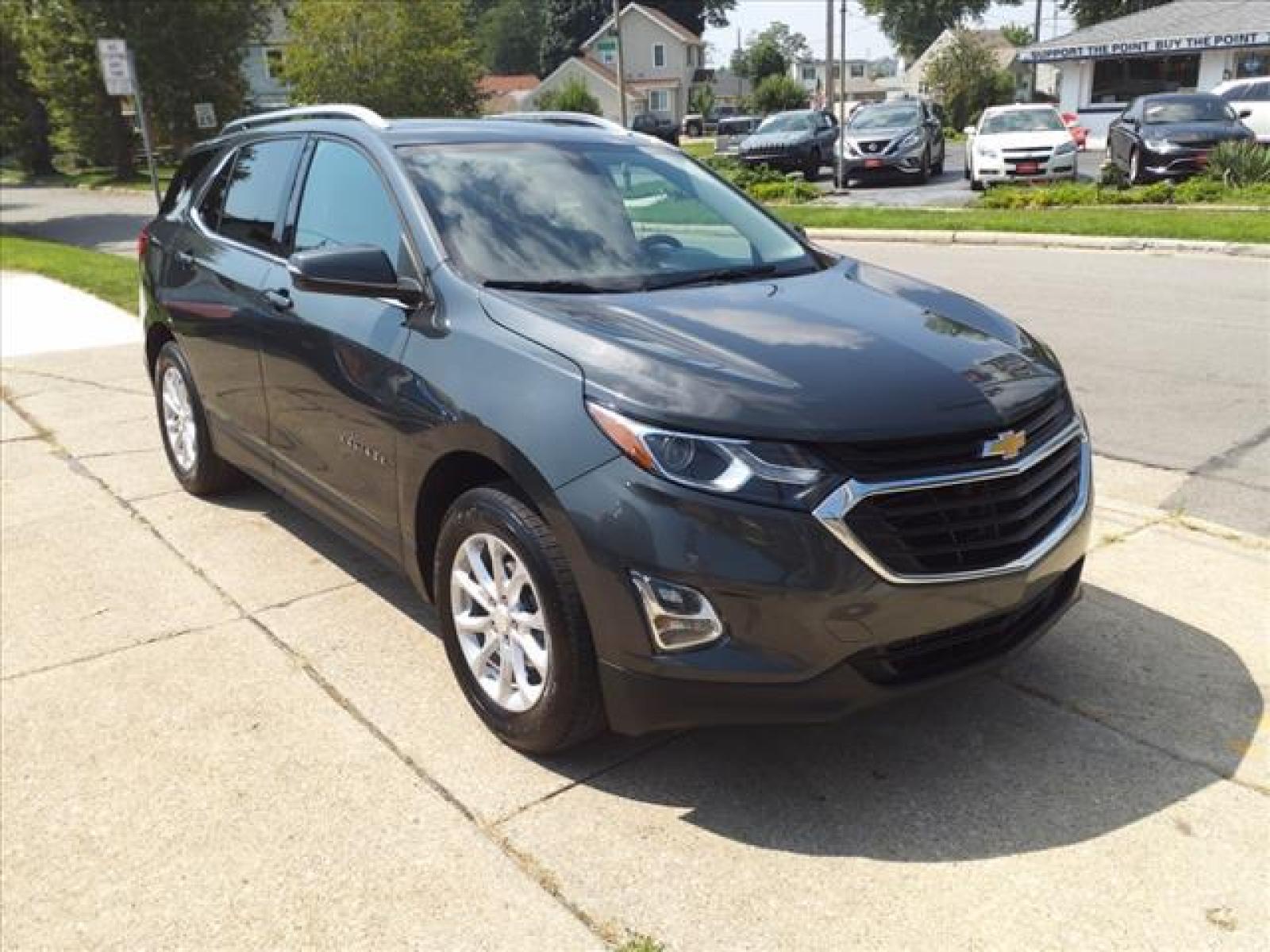 2018 Nightfall Gray Metallic Chevrolet Equinox LT (3GNAXSEVXJL) with an 1.5L 1.5L Turbo I4 170hp 203ft Direct Injection engine, 6-Speed Shiftable Automatic transmission, located at 5505 N. Summit St., Toledo, OH, 43611, (419) 729-2688, 41.654953, -83.530014 - Attention iPhone, iPod, and digital music junkies! Get your cable, plug it in here, and rock out! Take a deep breath, ahhh, still smells new, doesnt it? You can still get that new car smell thanks to the previous owner who did not smoke in this car! Buy with confidence - maintenance records a - Photo #18