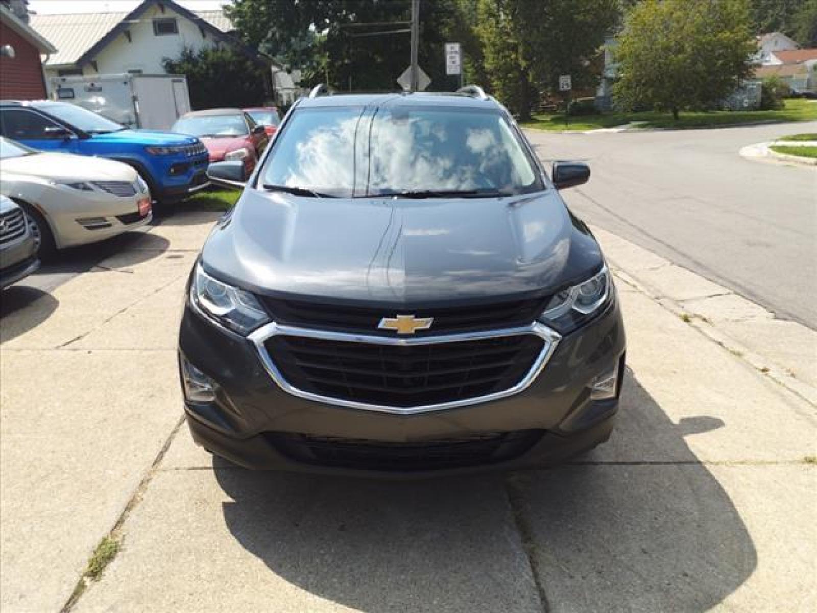 2018 Nightfall Gray Metallic Chevrolet Equinox LT (3GNAXSEVXJL) with an 1.5L 1.5L Turbo I4 170hp 203ft Direct Injection engine, 6-Speed Shiftable Automatic transmission, located at 5505 N. Summit St., Toledo, OH, 43611, (419) 729-2688, 41.654953, -83.530014 - Attention iPhone, iPod, and digital music junkies! Get your cable, plug it in here, and rock out! Take a deep breath, ahhh, still smells new, doesnt it? You can still get that new car smell thanks to the previous owner who did not smoke in this car! Buy with confidence - maintenance records a - Photo #19