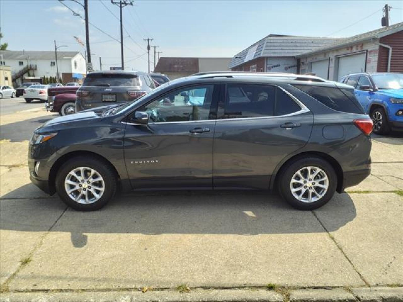2018 Nightfall Gray Metallic Chevrolet Equinox LT (3GNAXSEVXJL) with an 1.5L 1.5L Turbo I4 170hp 203ft Direct Injection engine, 6-Speed Shiftable Automatic transmission, located at 5505 N. Summit St., Toledo, OH, 43611, (419) 729-2688, 41.654953, -83.530014 - Attention iPhone, iPod, and digital music junkies! Get your cable, plug it in here, and rock out! Take a deep breath, ahhh, still smells new, doesnt it? You can still get that new car smell thanks to the previous owner who did not smoke in this car! Buy with confidence - maintenance records a - Photo #21