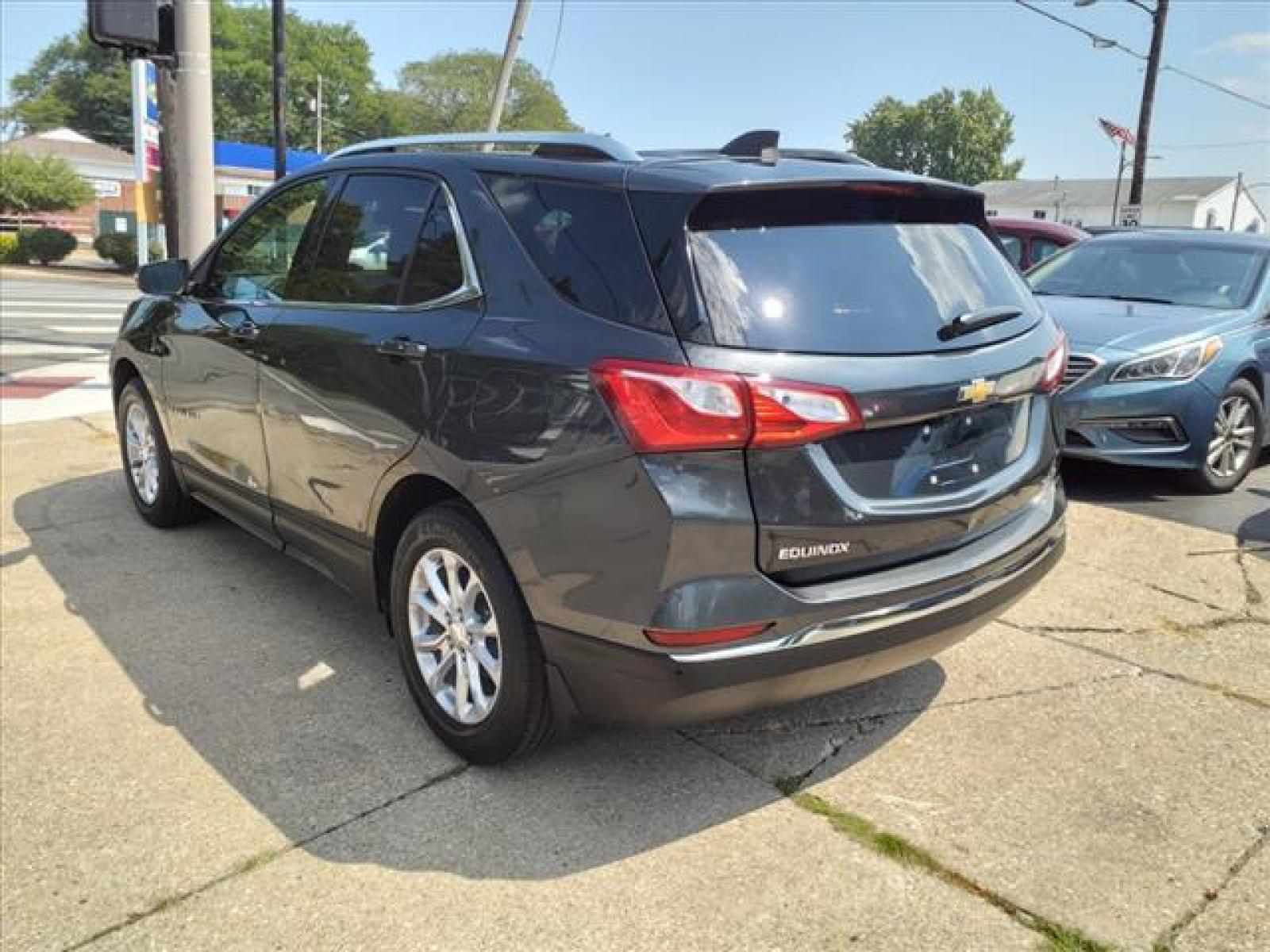 2018 Nightfall Gray Metallic Chevrolet Equinox LT (3GNAXSEVXJL) with an 1.5L 1.5L Turbo I4 170hp 203ft Direct Injection engine, 6-Speed Shiftable Automatic transmission, located at 5505 N. Summit St., Toledo, OH, 43611, (419) 729-2688, 41.654953, -83.530014 - Attention iPhone, iPod, and digital music junkies! Get your cable, plug it in here, and rock out! Take a deep breath, ahhh, still smells new, doesnt it? You can still get that new car smell thanks to the previous owner who did not smoke in this car! Buy with confidence - maintenance records a - Photo #22