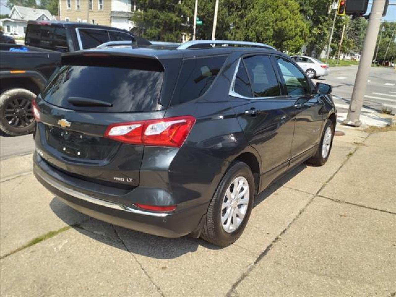 2018 Nightfall Gray Metallic Chevrolet Equinox LT (3GNAXSEVXJL) with an 1.5L 1.5L Turbo I4 170hp 203ft Direct Injection engine, 6-Speed Shiftable Automatic transmission, located at 5505 N. Summit St., Toledo, OH, 43611, (419) 729-2688, 41.654953, -83.530014 - Attention iPhone, iPod, and digital music junkies! Get your cable, plug it in here, and rock out! Take a deep breath, ahhh, still smells new, doesnt it? You can still get that new car smell thanks to the previous owner who did not smoke in this car! Buy with confidence - maintenance records a - Photo #24