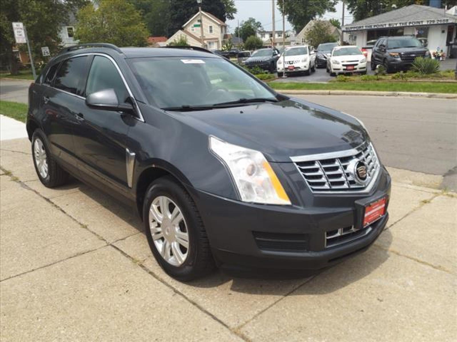 2013 Black Ice Metallic Cadillac SRX Base (3GYFNAE38DS) with an 3.6L 3.6L Flex Fuel V6 308hp 2 Direct Injection engine, 6-Speed Shiftable Automatic transmission, located at 5505 N. Summit St., Toledo, OH, 43611, (419) 729-2688, 41.654953, -83.530014 - Photo #17