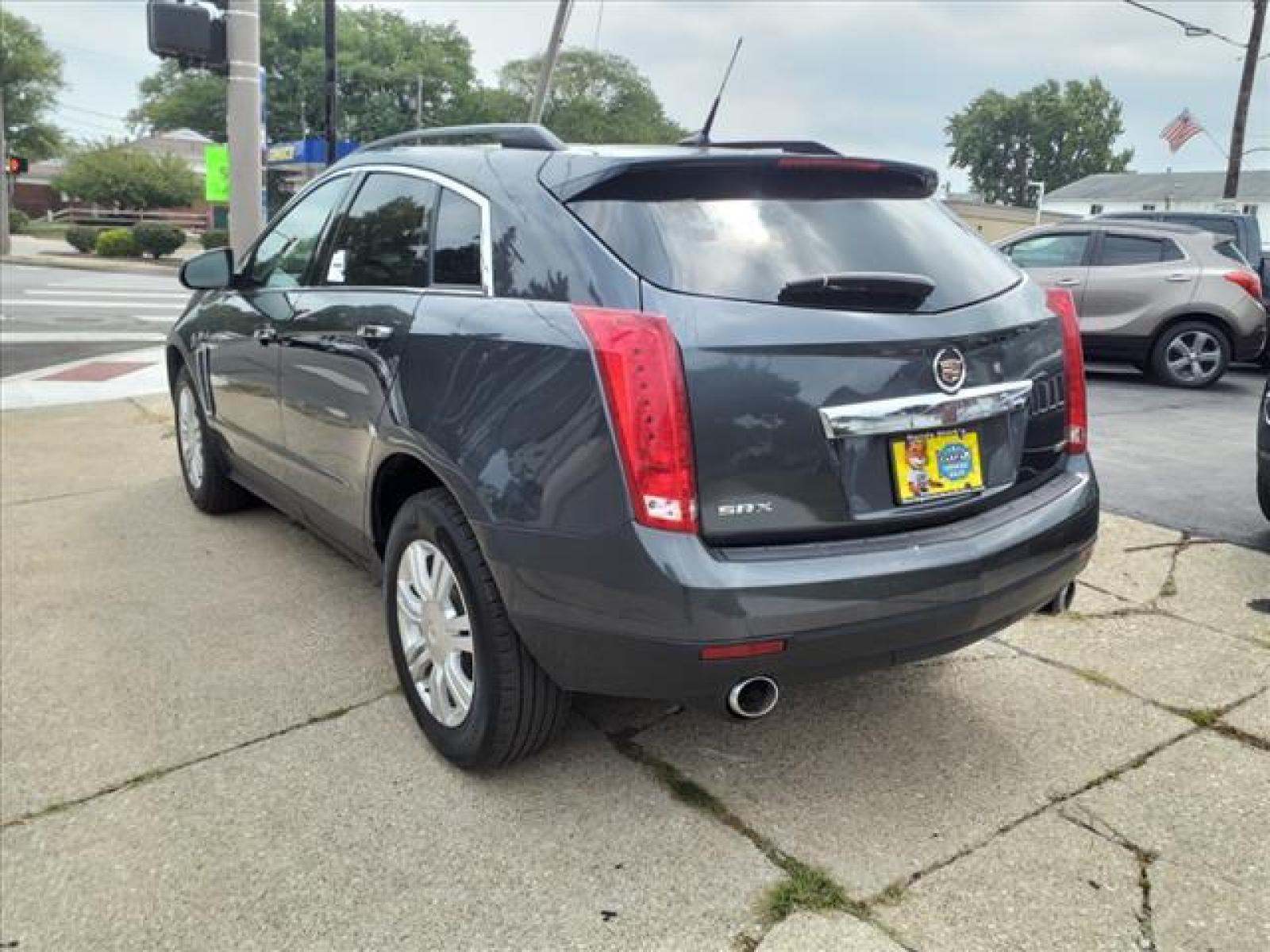 2013 Black Ice Metallic Cadillac SRX Base (3GYFNAE38DS) with an 3.6L 3.6L Flex Fuel V6 308hp 2 Direct Injection engine, 6-Speed Shiftable Automatic transmission, located at 5505 N. Summit St., Toledo, OH, 43611, (419) 729-2688, 41.654953, -83.530014 - Photo #21