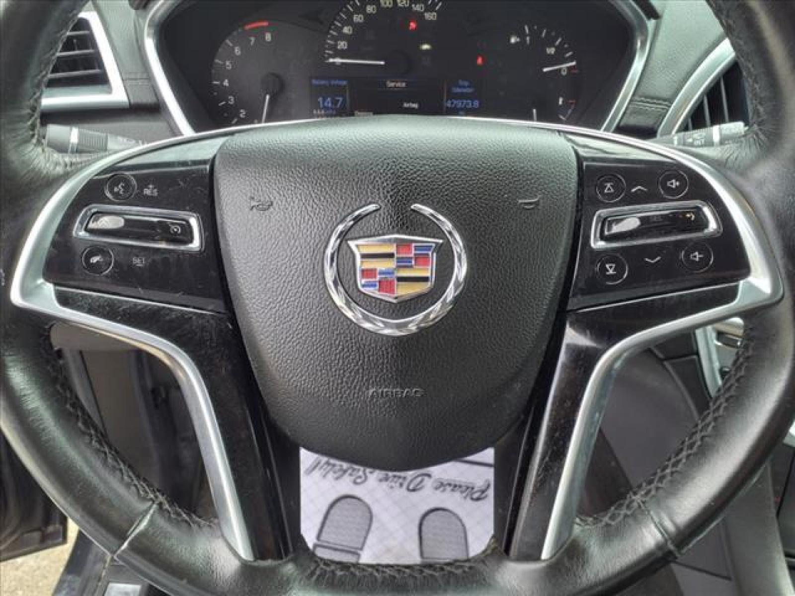 2013 Black Ice Metallic Cadillac SRX Base (3GYFNAE38DS) with an 3.6L 3.6L Flex Fuel V6 308hp 2 Direct Injection engine, 6-Speed Shiftable Automatic transmission, located at 5505 N. Summit St., Toledo, OH, 43611, (419) 729-2688, 41.654953, -83.530014 - Photo #7