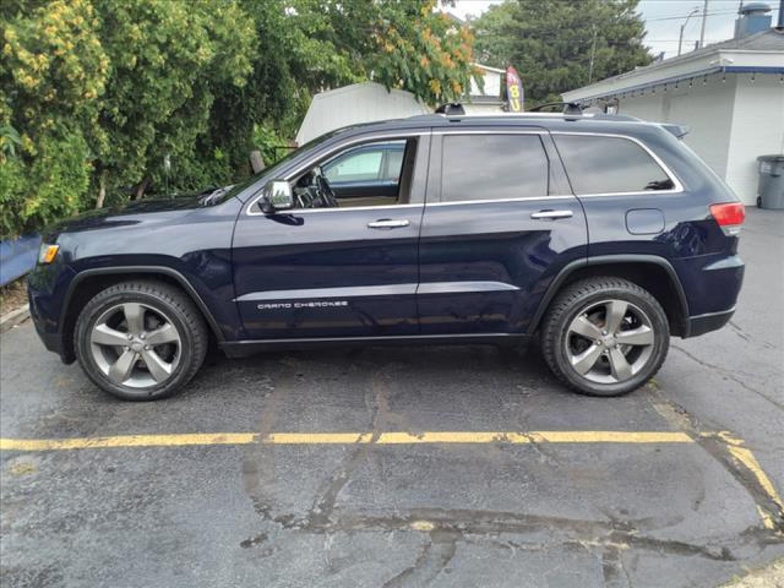 2014 True Blue Pearl Coat Jeep Grand Cherokee Limited (1C4RJFBG9EC) with an 3.6L 3.6L V6 290hp 260ft. lbs. Sequential Multiport Fuel Injection engine, 8-Speed Shiftable Automatic transmission, located at 5505 N. Summit St., Toledo, OH, 43611, (419) 729-2688, 41.654953, -83.530014 - Photo #0