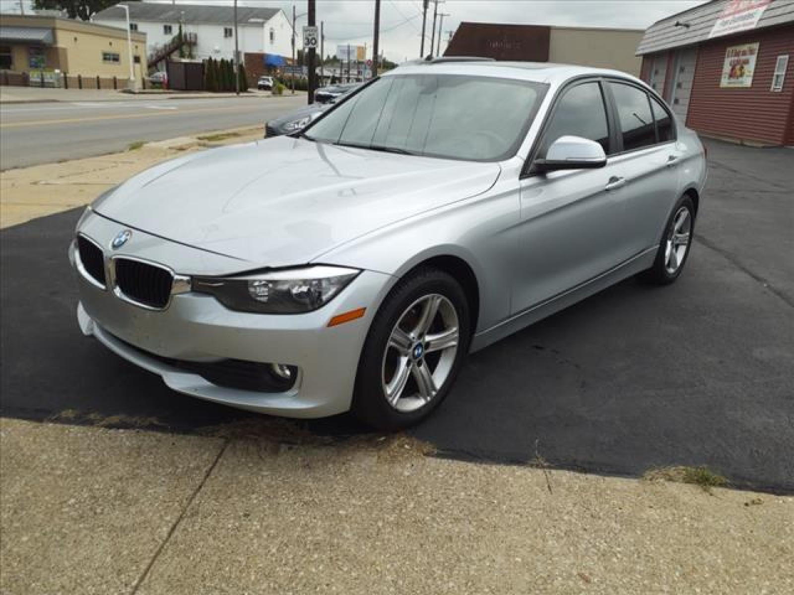 2015 Glacier Silver Metallic BMW 3 Series 320i xDrive (WBA3C3G56FN) with an 2.0L 2.0L Turbo I4 180hp 200ft Direct Injection engine, 8-Speed Shiftable Automatic transmission, located at 5505 N. Summit St., Toledo, OH, 43611, (419) 729-2688, 41.654953, -83.530014 - No cigarette burns or dirty ash trays here. This previously owned vehicle was a Non Smoker vehicle. Come by today to see this one in person. A premium 'turn by turn' navigation system is included. Extra clean. No rips, no abuse, no cigarette burns. This vehicle is loaded with lot of extras. Sup - Photo #16
