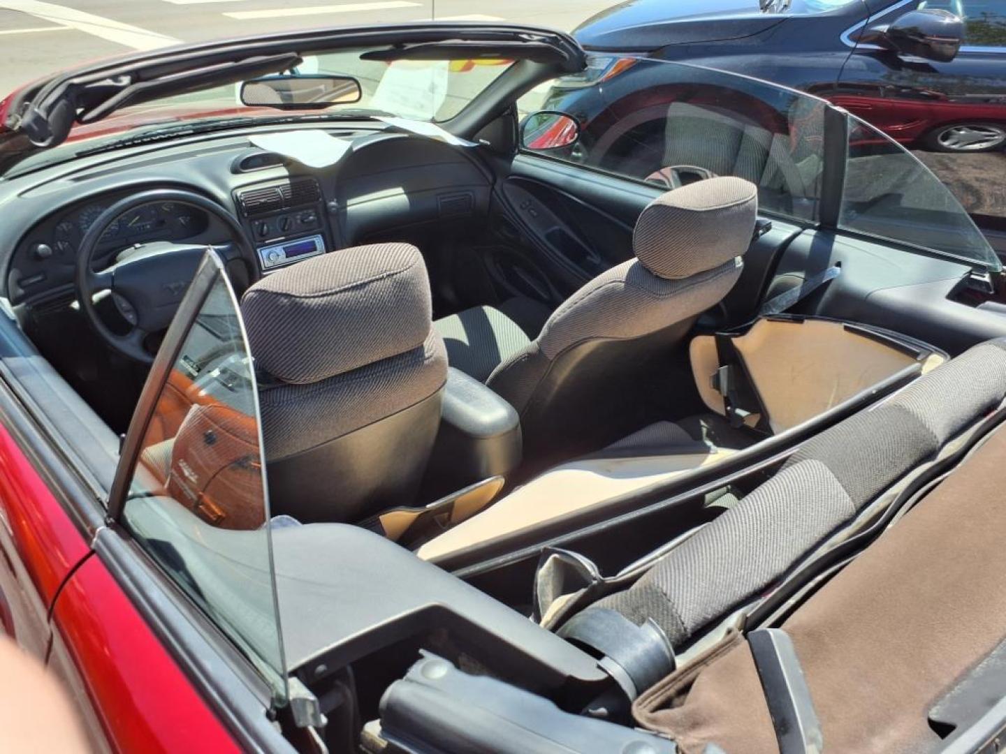 1995 Ultra Red 000 Ford Mustang GT (1FALP45T5SF) with an 5.0L 5.0L NA V8 overhead valves (OHV) 16V Fuel Injected engine, 5-Speed Manual transmission, located at 5505 N. Summit St., Toledo, OH, 43611, (419) 729-2688, 41.654953, -83.530014 - Photo#27