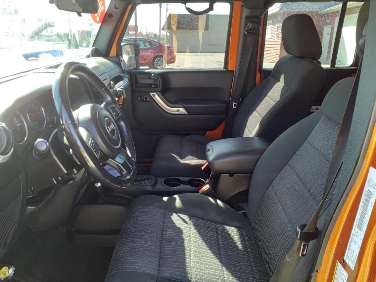 2011 Mango Tango Pearl Coat Pvg Jeep Wrangler Unlimited 4x4 Sahara (1J4BA5H17BL) with an 3.8L 3.8L V6 202hp 237ft. lbs. Sequential Multiport Fuel Injection engine, 4-Speed Automatic transmission, located at 5505 N. Summit St., Toledo, OH, 43611, (419) 729-2688, 41.654953, -83.530014 - Photo#1