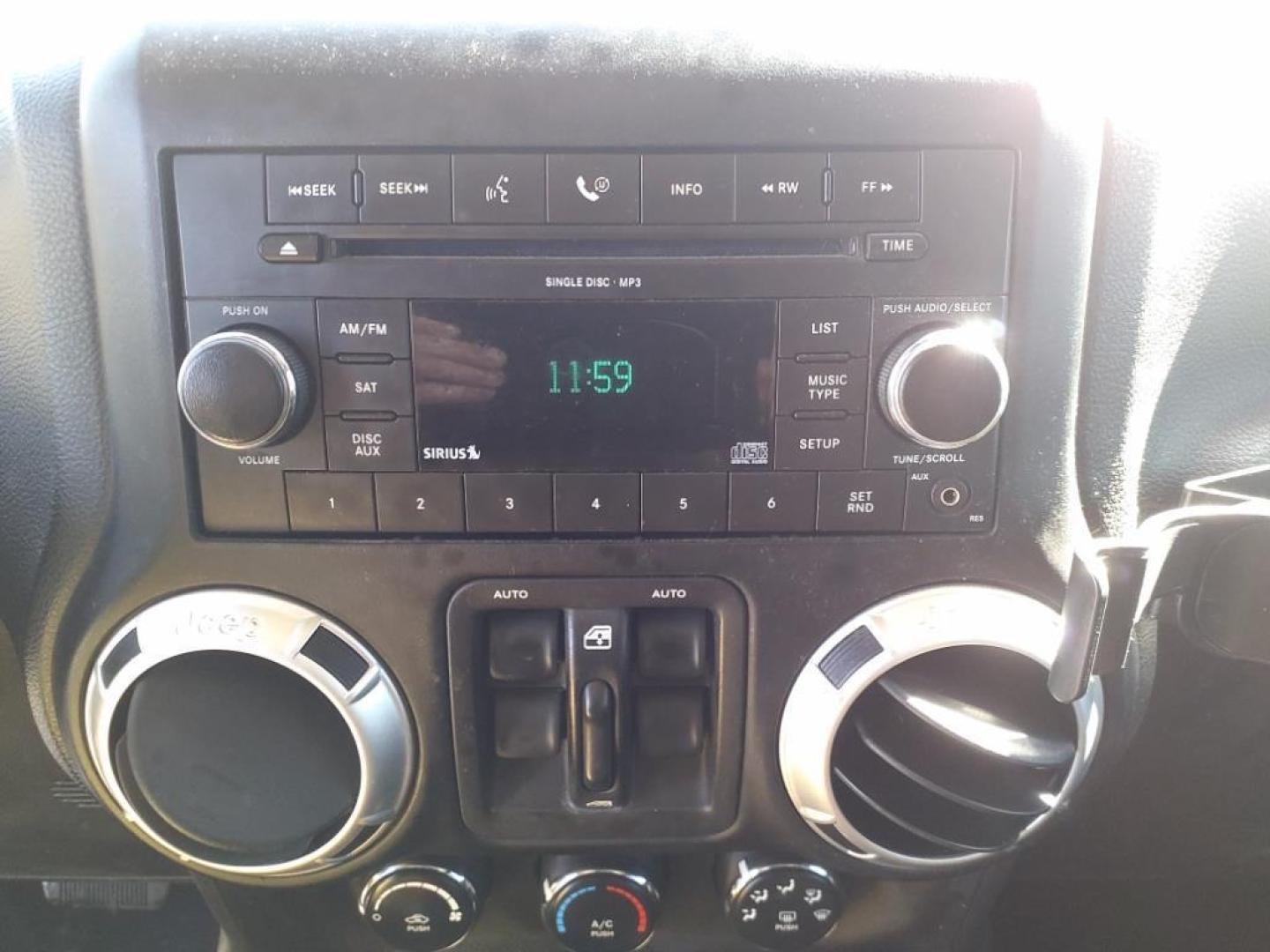 2011 Mango Tango Pearl Coat Pvg Jeep Wrangler Unlimited 4x4 Sahara (1J4BA5H17BL) with an 3.8L 3.8L V6 202hp 237ft. lbs. Sequential Multiport Fuel Injection engine, 4-Speed Automatic transmission, located at 5505 N. Summit St., Toledo, OH, 43611, (419) 729-2688, 41.654953, -83.530014 - Photo#8