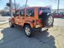 2011 Mango Tango Pearl Coat Pvg Jeep Wrangler Unlimited 4x4 Sahara (1J4BA5H17BL) with an 3.8L 3.8L V6 202hp 237ft. lbs. Sequential Multiport Fuel Injection engine, 4-Speed Automatic transmission, located at 5505 N. Summit St., Toledo, OH, 43611, (419) 729-2688, 41.654953, -83.530014 - Photo#15