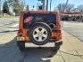 2011 Mango Tango Pearl Coat Pvg Jeep Wrangler Unlimited 4x4 Sahara (1J4BA5H17BL) with an 3.8L 3.8L V6 202hp 237ft. lbs. Sequential Multiport Fuel Injection engine, 4-Speed Automatic transmission, located at 5505 N. Summit St., Toledo, OH, 43611, (419) 729-2688, 41.654953, -83.530014 - Photo#16