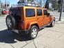 2011 Mango Tango Pearl Coat Pvg Jeep Wrangler Unlimited 4x4 Sahara (1J4BA5H17BL) with an 3.8L 3.8L V6 202hp 237ft. lbs. Sequential Multiport Fuel Injection engine, 4-Speed Automatic transmission, located at 5505 N. Summit St., Toledo, OH, 43611, (419) 729-2688, 41.654953, -83.530014 - Photo#17